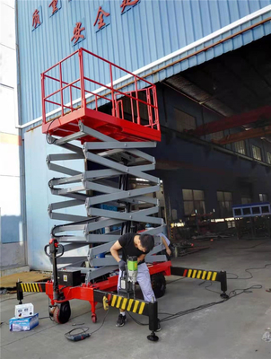 Ascensore mobile motorizzato elettrico idraulico aereo industriale di forbici della piattaforma di funzionamento